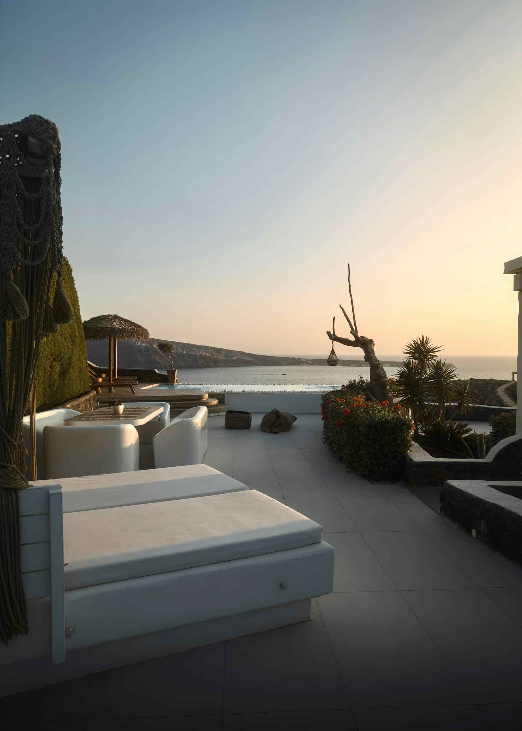 Lounge terrace overlooking the sea at sunset